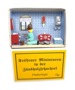 Zündholzschachtel – Fließenleger